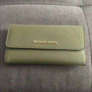 Olive green Micheal Kors trifold wallet.